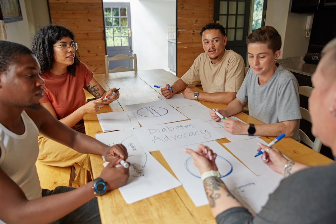 Diverse team collaborating during a personal development workshop