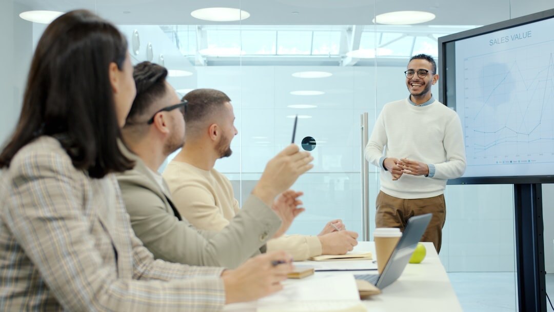 Group of professionals applauding during a training session