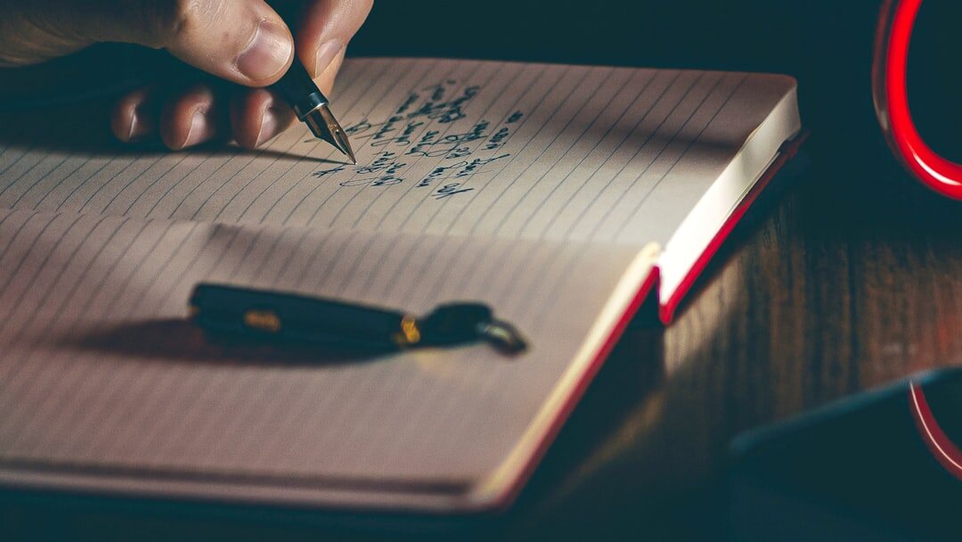 person writing notes